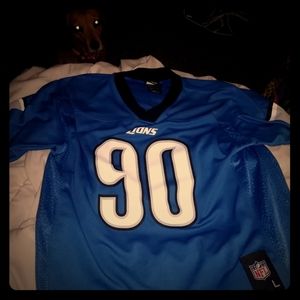 Lightly used short sleeved Detroit Lions jersey